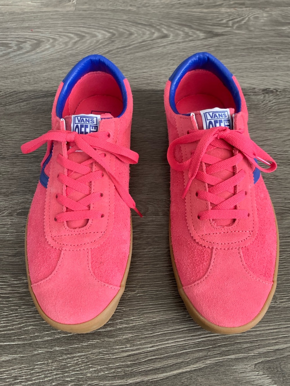Vans men’s Pink Suede Low-Top Sneakers with Blue Accents